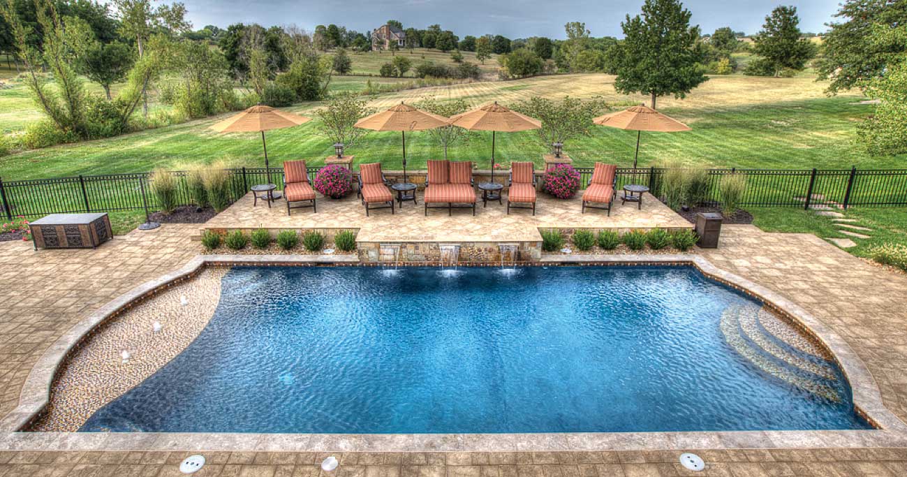 A-traditional-pool-with-fountains-from-Backyard-by-Design-Kansas-City