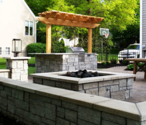 Stonework-patio-firepit-by-Backyard-by-Design-Kansas-City