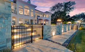 Backyard by design luxurious lighting, landscaping and furniture