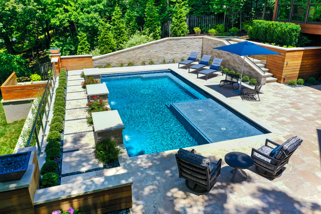 Backyard by design beautiful pool, patio and landscaping