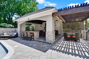 Backyard by design patio enclosure, bar and furniture